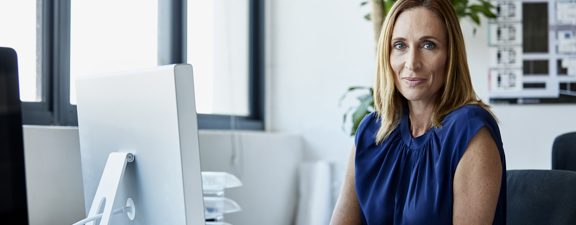 A woman sitting at a desk